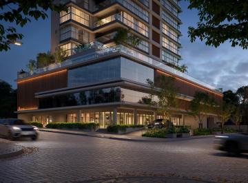 Embasamento do Surya iluminado à noite (imagem ilustrativa) · Cobertura duplex de 4 suítes e 347 m² com piscina no Surya, Praia Brava