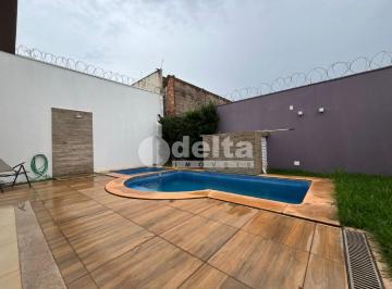 NULL · Casa Com 4 Quartos Sendo Suítes Disponível Para Venda No Bairro Vigilato Pereira Em Uberlândia - Mg